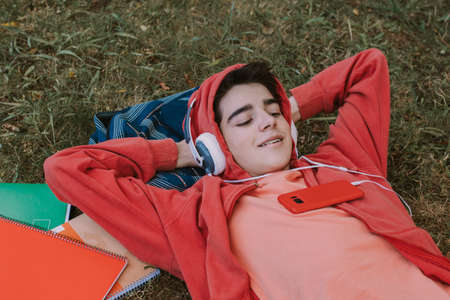 student with books on campusの写真素材