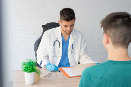 doctor in consultation with patient, health and medicine