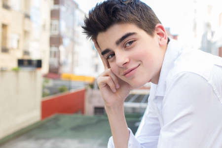 portrait of young teen on the city terrace