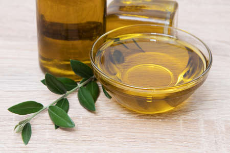 extra virgin olive oil in glass containerの写真素材
