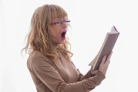 adult woman with book isolated on white backgroundの写真素材