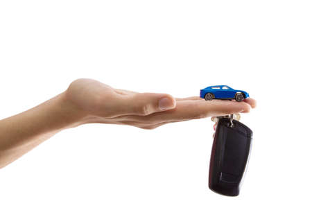 hand with car and vehicle keys, concept buy carの写真素材