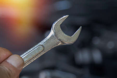 hand with car workshop toolの写真素材