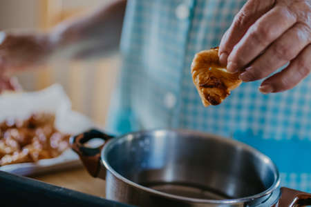 woman making traditional Christmas sweets and dessertsの写真素材