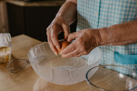 woman hands making desserts or sweetsの写真素材