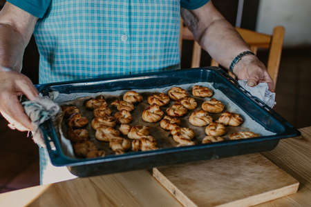 woman making traditional Christmas sweets and dessertsの写真素材