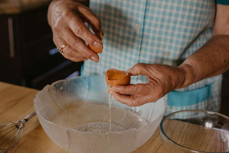 woman hands making desserts or sweetsの写真素材