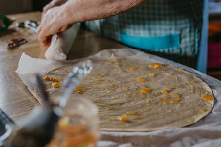 preparing traditional pie or dessertsの写真素材