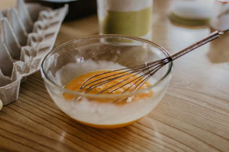 bowl or plate with beaten eggの写真素材