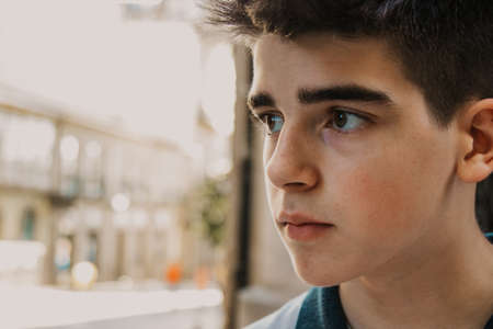 close-up portrait of young latin man outdoorsの写真素材