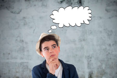 thoughtful boy with cloud with space for text