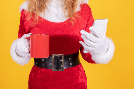 santa claus woman isolated on color backgroundの写真素材