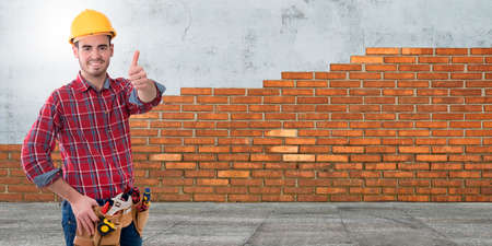 construction professional with okay sign or greetingの写真素材