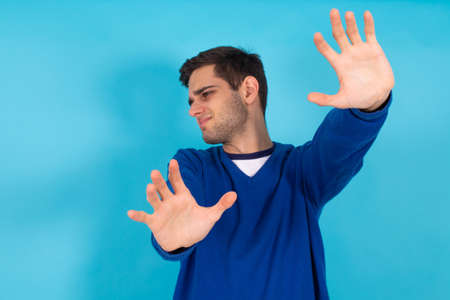 young man isolated on color background