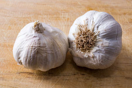 natural garlic on wooden backgroundの写真素材