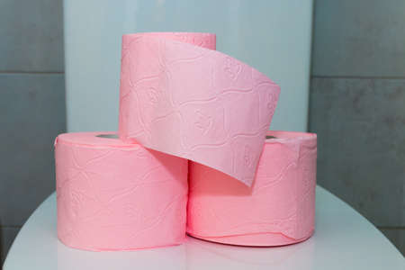 colored household toilet paper in the bathroom or toiletの写真素材