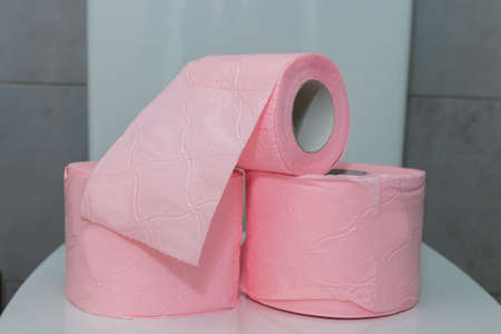 colored household toilet paper in the bathroom or toiletの写真素材