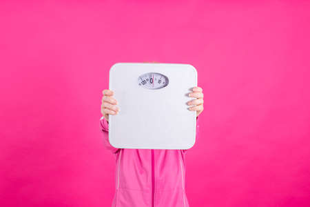 woman with weight loss, weight and diet scaleの写真素材