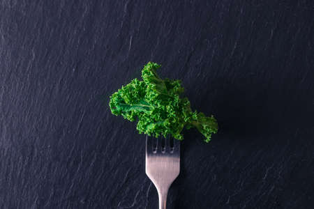 fork with vegetable vegan or vegetarian diet conceptの写真素材