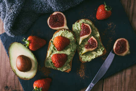 avocado background with natural fruitsの写真素材