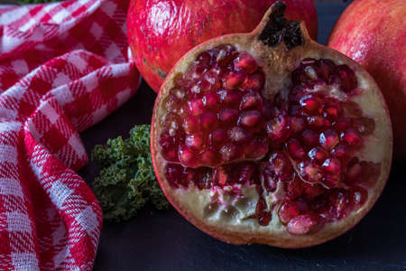 ripe open natural pomegranate fruitの写真素材