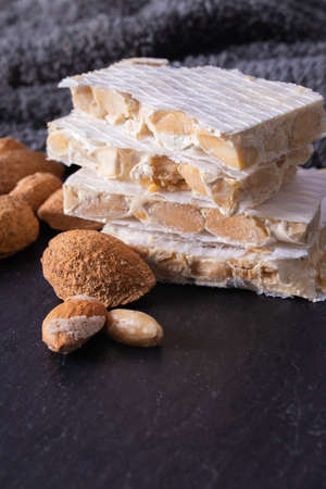 white nougat with traditional christmas almondsの写真素材