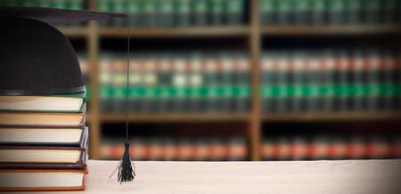 mortarboard and books about bookstore