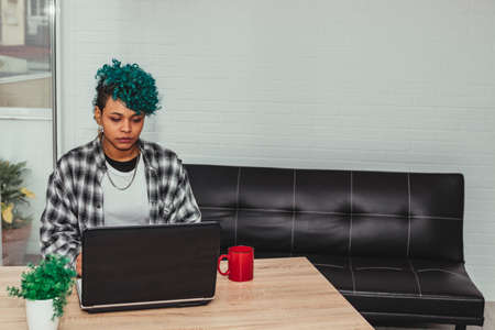 woman or student girl with computer at home or apartment