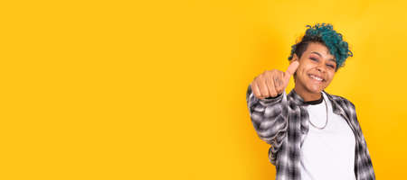 isolated girl with gesture of satisfaction and approval isolated on color background