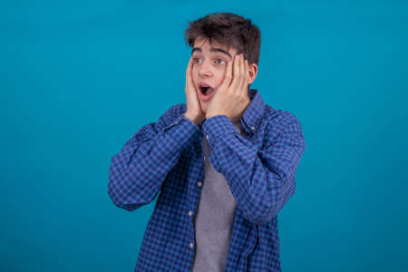 young teenager or student boy in casual style isolated on color background