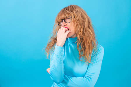 adult or senior woman isolated on color background