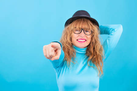adult or senior woman isolated on color background