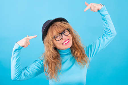 adult or senior woman isolated on color backgroundの写真素材