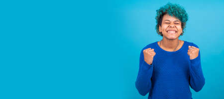 young woman hipster isolated on color backgroundの写真素材