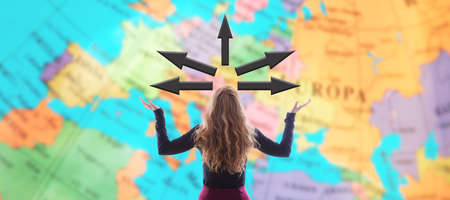 woman from behind looking at map, tourism and travel