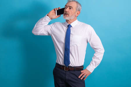 adult business man isolated on color backgroundの写真素材