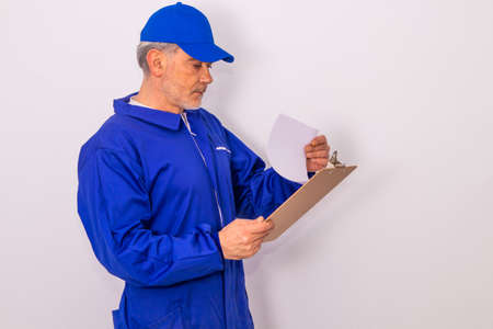 man with transport or service workwear isolated on white backgroundの写真素材