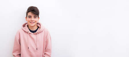 young teenager boy smiling isolated on white backgroundの写真素材