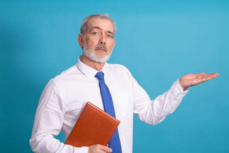 businessman with tie and agenda or book isolated on background