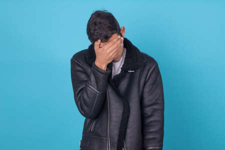 young man or teenager male isolated on color backgroundの写真素材