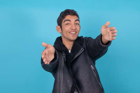 young expressive male model isolated on color background