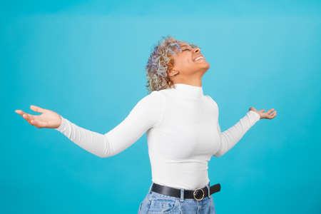isolated african american young girl with joyous happy expressionの写真素材
