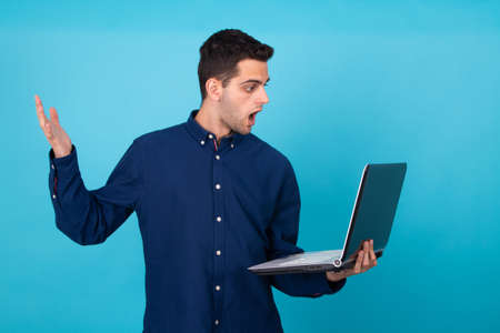 young man computer isolated on backgroundの写真素材