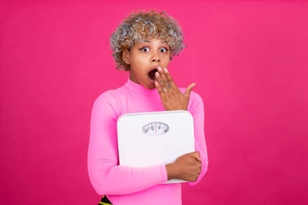 girl with sportswear and scale isolated