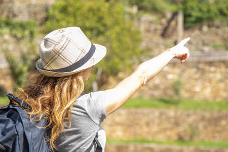 woman with backpack traveling outdoorsの写真素材