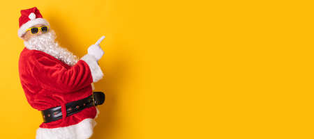 santa claus isolated on background pointingの写真素材