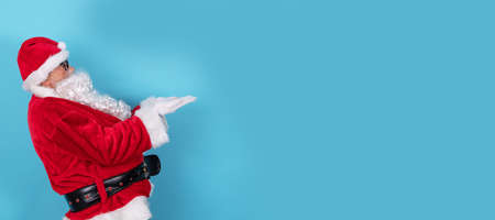 santa claus pointing isolated on backgroundの写真素材