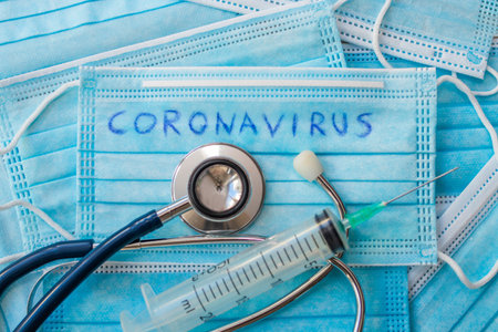 coronavirus pandemic mask and vaccineの写真素材