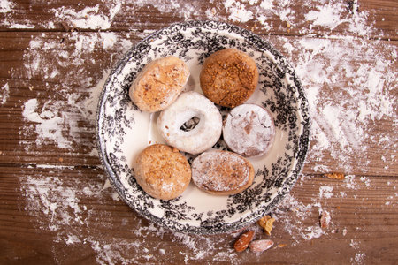 traditional christmas powders on rustic wood with ornamentsの写真素材