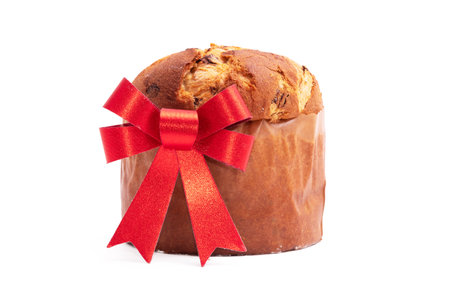 christmas panettone with red bow isolated on white backgroundの写真素材